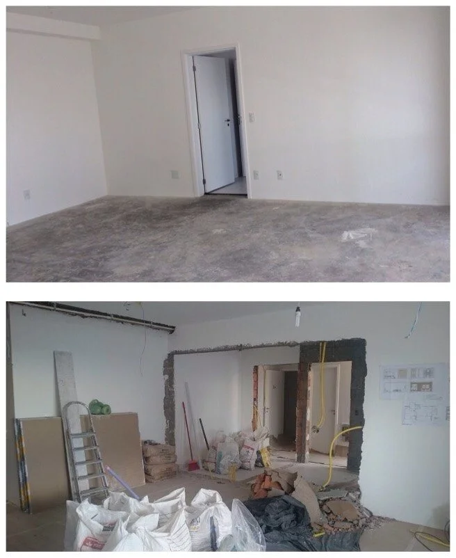 Reforma de apartamento durante a execução da obra Apartamento durante reforma com abertura de parede e materiais da obra