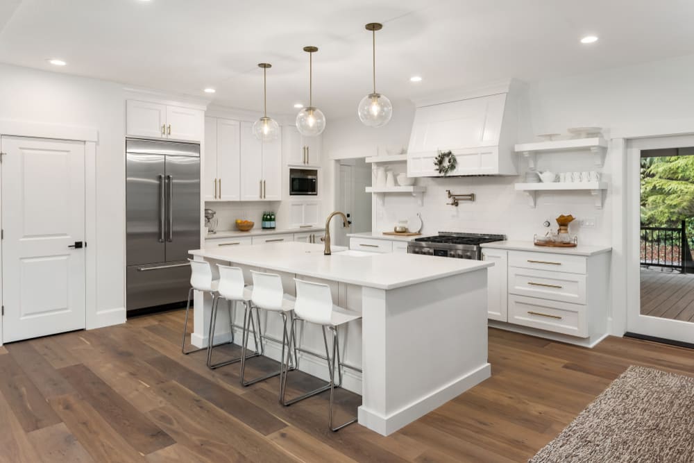 white kitchen with white furniture - 4 questions to ask before your next renovation