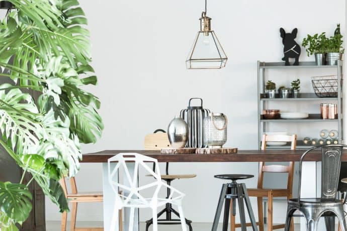 space with metal shelf and wooden table - 5 rules in Interior Design that we are begging you to break!