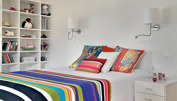Dicas de como decorar um quarto colorido com almofadas