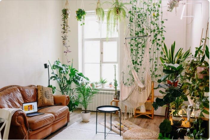 Crie uma parede de quadros e decore com plantas