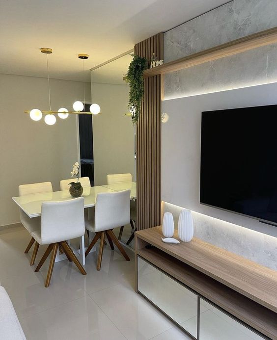 Inspire-se com mais de 40 Ideias de Decoração para Sala de TV 16 17. Por outro lado, uma sugestão é apostar em espaços conjugados. A sala de tv e a sala de jantar, por exemplo, são espaços que frequentemente se conectam através disso.