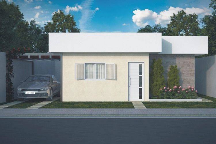 7 Vantagens de Ter uma Casa Caixote e 30 ideias para se inspirar! 14 Fachada de casa com telhado embutido trazendo modernidade ao projeto.