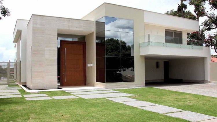 7 Vantagens de Ter uma Casa Caixote e 30 ideias para se inspirar! 1 Telhado embutido em casa moderna, ideal para quem busca uma aparência clean e linhas retas.