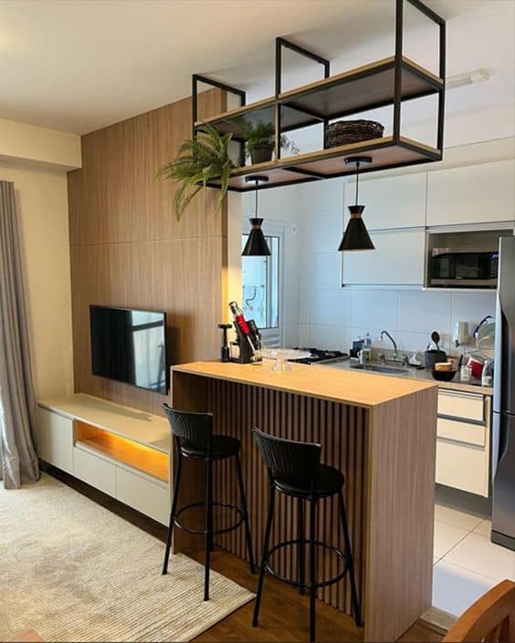 12 Ideias para Cozinha com Copa Integrada que Você Vai Amar 13 Integração entre cozinha, copa e sala em apartamentos pequenos.