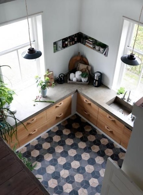 15 Ideias Inovadoras para Cozinha de Alvenaria 10 Imagem 10: Cozinha de alvenaria com bancada em L para melhor aproveitamento do espaço.