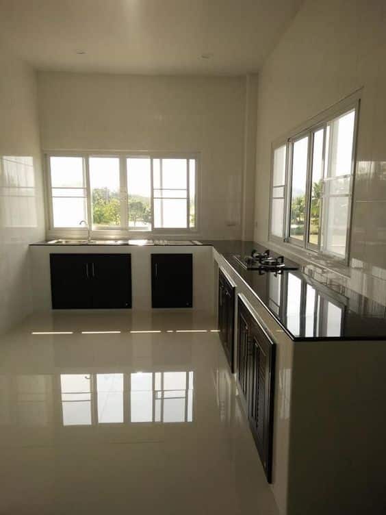 15 Ideias Inovadoras para Cozinha de Alvenaria 16 Imagem 16: Cozinha de alvenaria com revestimento de porcelanato.