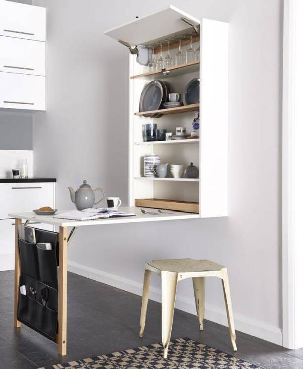 12 Tipos de Mesa Dobrável para Espaços Pequenos e Funcionais 13 Quanto mais funcional, melhor! Aproveite o pé da mesa para armazenamento.