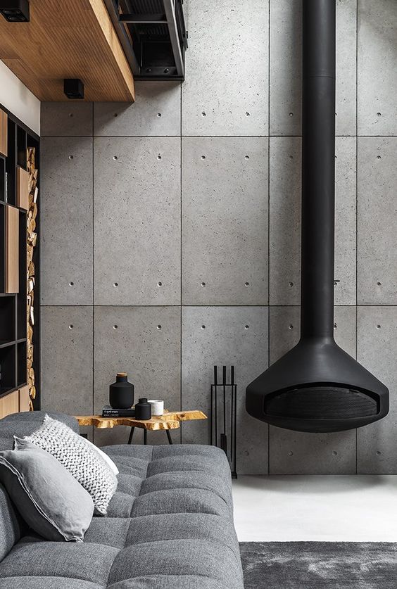 12 Ideias de Placa Cimentícia para uma Decoração Sofisticada 5 Casa em estilo industrial com cimento, preto, madeira e objetos metálicos.