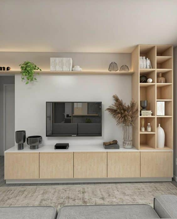 Por outro lado, caso tenha mais espaço, também poderá aproveitá-lo melhor. O rack abaixo é sinal disso, pois ainda conta com um espaço lateral dividido em nichos para organização e decoração.