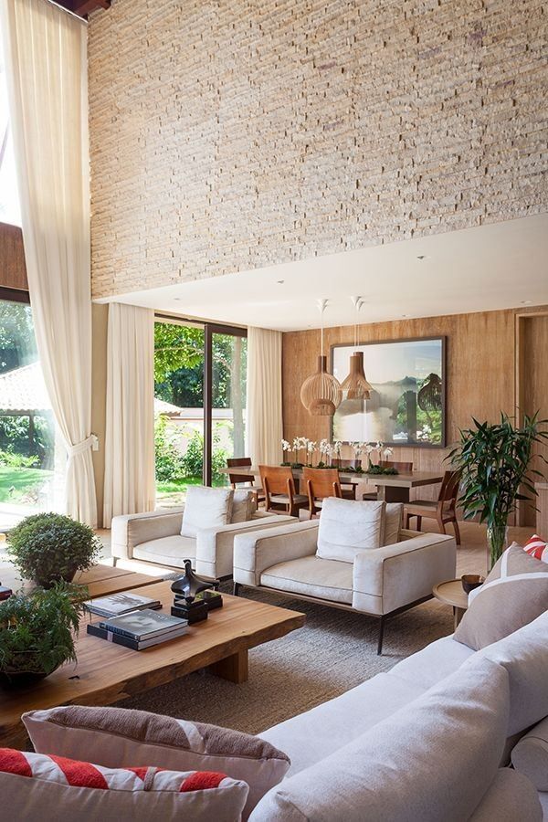 14 Inspirações Impressionantes para Sala com Pé Direito Duplo 7 Impressionante decoração com paredes texturizadas.