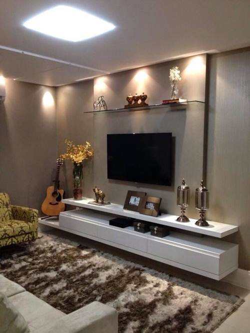 15 Ideias de Salas de TV Decoradas que Você Vai Adorar 7 Quando um tapete faz toda a diferença!
