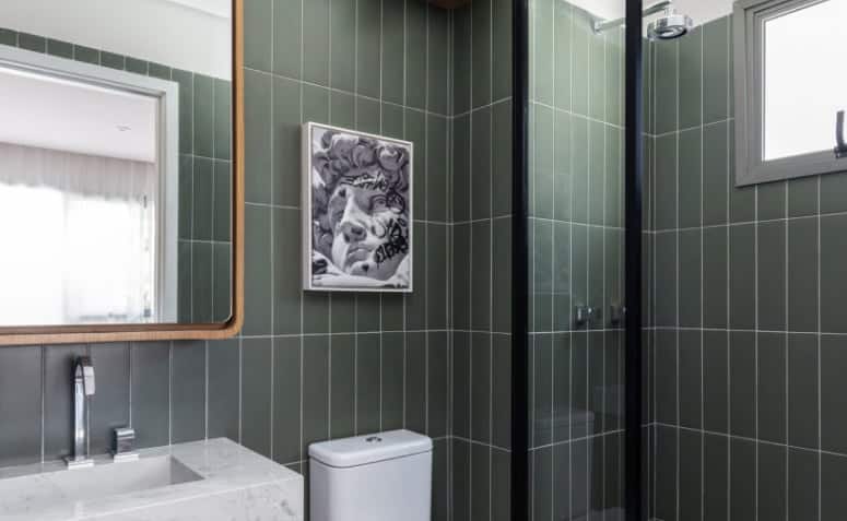 Tendências e Ideias de Banheiros Modernos para Renovar seu Espaço 6 Imagem de um banheiro moderno decorado com materiais naturais.