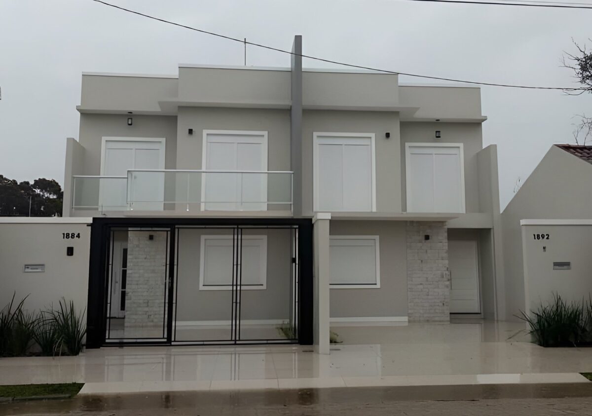 Vantagens e Desvantagens de Morar em uma Casa Geminada 6 Casa geminada com ambientes aconchegantes e bem projetados.
