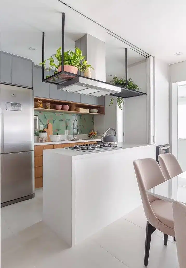 Dicas e Modelos de Bancadas de Cozinha para Ambientes Funcionais 9 Duas alturas na bancada para preparo e refeições.