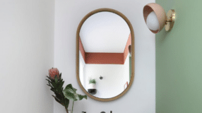 Espelhos para Sala: Ideias de Decoração e Compras Online 9 Espelho oval que transforma ambientes.