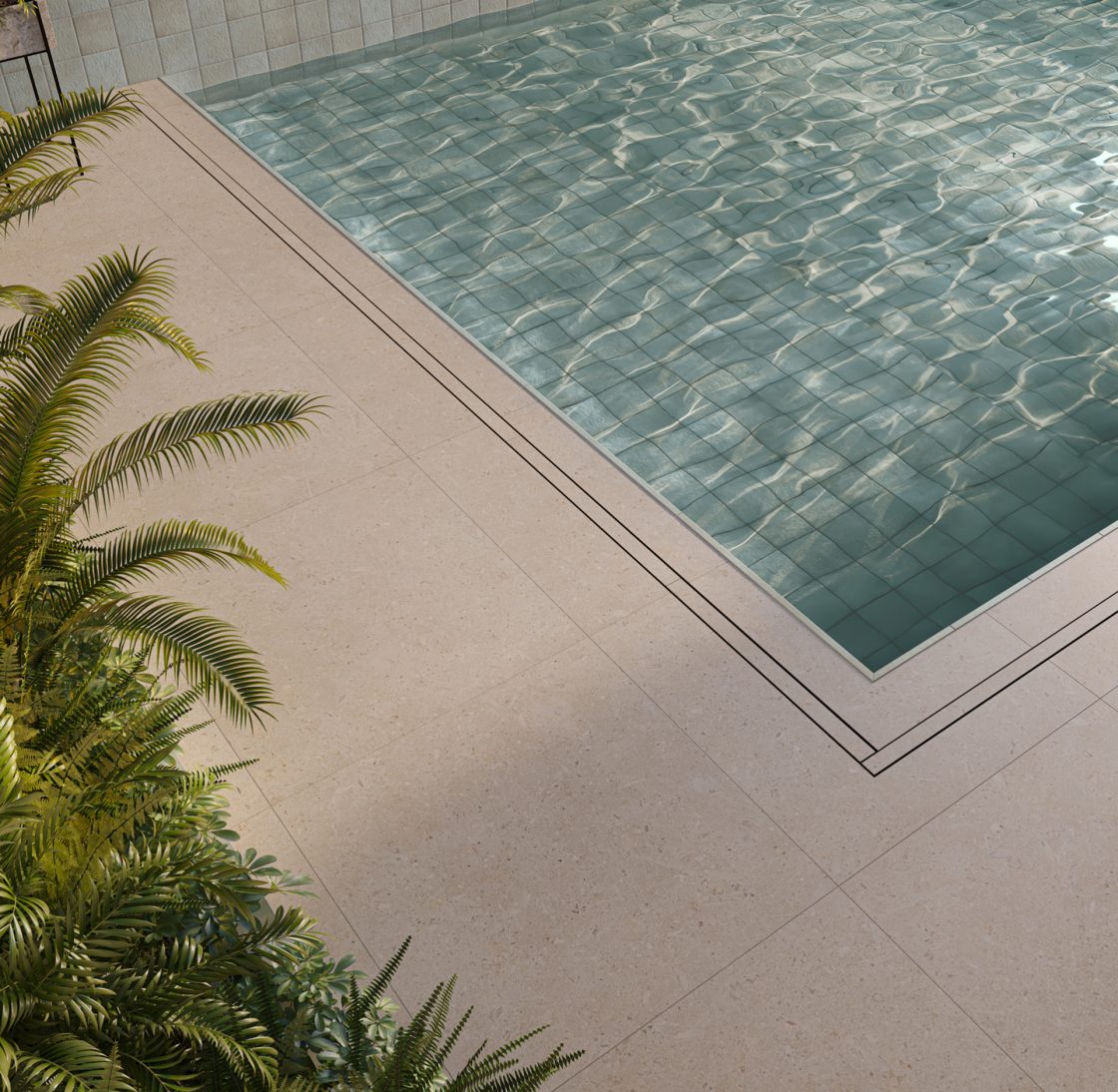Detalhe da borda de uma piscina com revestimento acinzentado e duas cadeiras