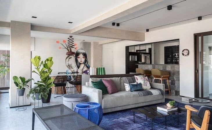 Imagem de uma sala estilo industrial com cimento queimado.