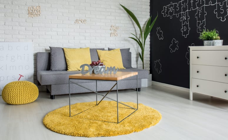10 Inspirações de Tapete Redondo para Sala e Como Usá-los na Decoração 3 Imagem de um tapete redondo para sala.