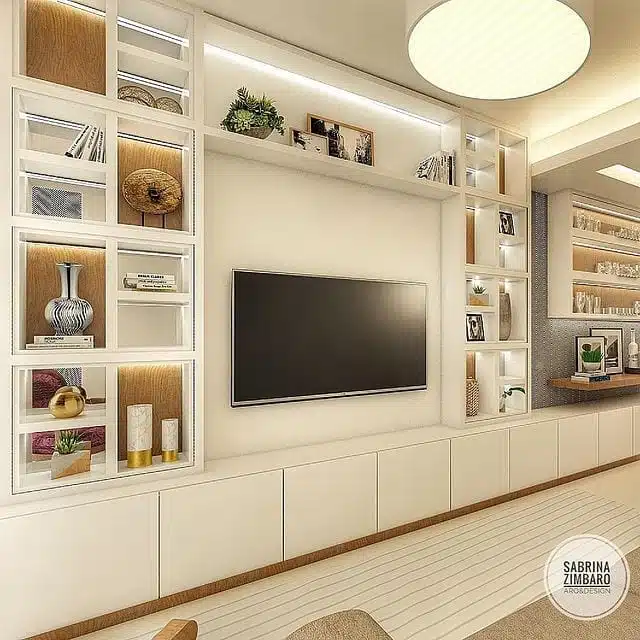 Estante de gesso para sala com TV, nichos iluminados e armários inferiores