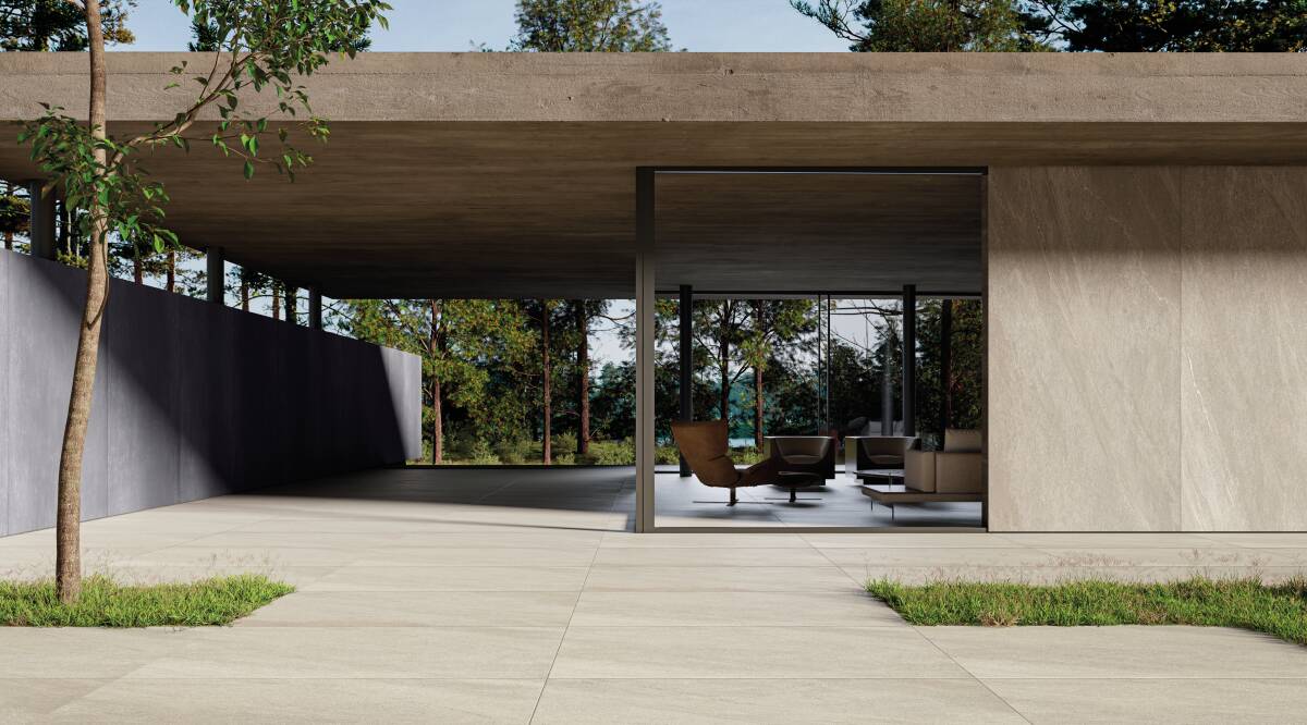 Inspirações para revestir muros com porcelanato: 10 ideias criativas 10 Porcelanato que reproduz concreto dá toque industrial ao muro.