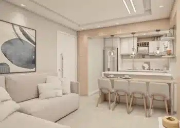 Você Está Usando o Piso Vinílico na Cozinha Corretamente? Veja os Benefícios e Dicas Essenciais! 10 Cozinha americana com sala, mostrando integração dos ambientes.