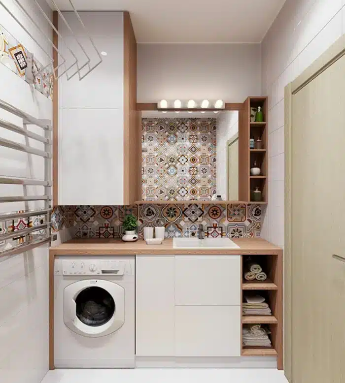 Decoração de Lavanderias Pequenas: Dicas para um Ambiente Funcional 9 Foto de uma lavanderia pequena com uma máquina de lavar e secar compacta.