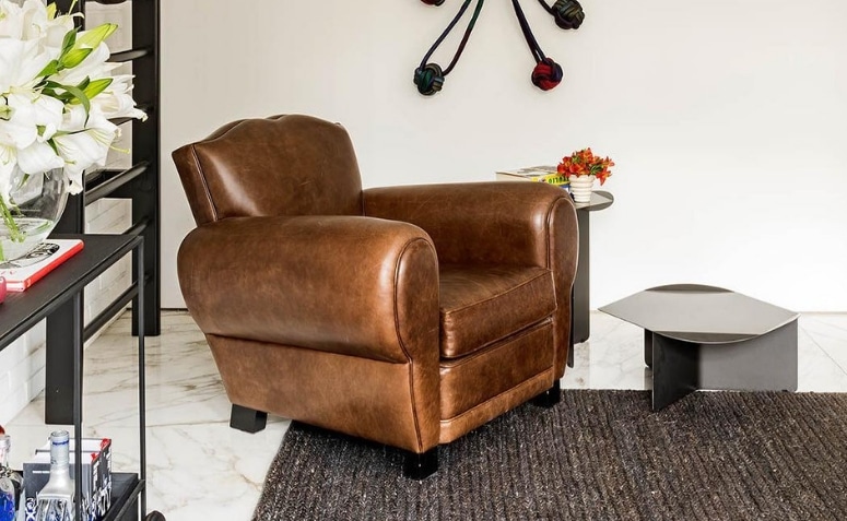Descubra como escolher poltronas incríveis para sua sala: 70 modelos que vão inspirar sua decoração! 3 Poltrona essencial para complementar a decoração de uma sala de estar, oferecendo conforto.