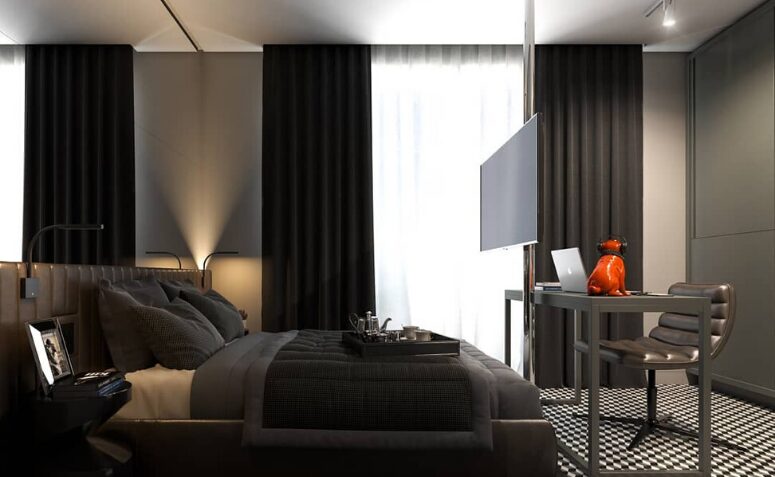 Ideias de decoração com cortinas pretas para criar um ambiente luxuoso e exclusivo 3 Imagem de uma cortina preta em ambiente decorado.