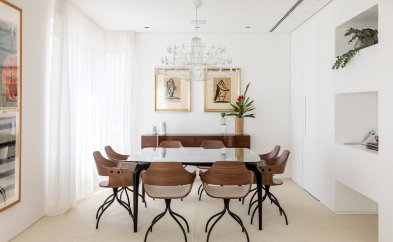 Quadros que transformam a sua sala de jantar através da arte 3 Quadros coloridos e neutros que trazem alegria e vida ao espaço.
